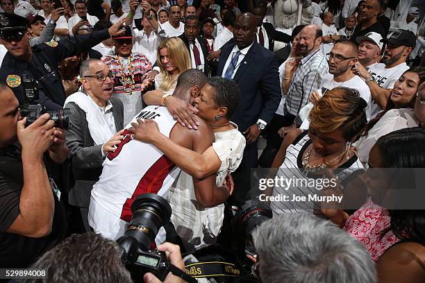 Dwyane Wade of the Miami Heat and his mom Jolinda Wade celebrate a victory against the Toronto Raptors in Game Four of the Eastern Conference...