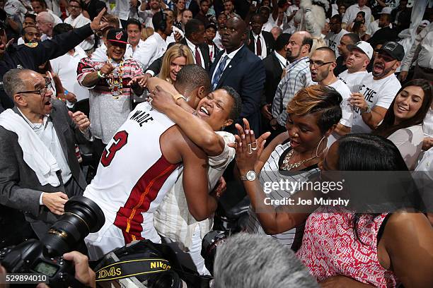 Dwyane Wade of the Miami Heat and his mom Jolinda Wade celebrate a victory against the Toronto Raptors in Game Four of the Eastern Conference...