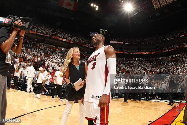 Dwyane Wade of the Miami Heat is interviewed after the game against the Toronto Raptors in Game Four of the Eastern Conference Semifinals at...