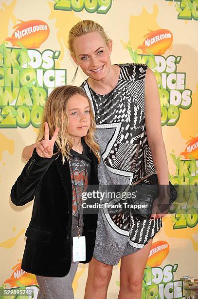 Actress Amber Valletta and son Auden McCaw arrive at Nickelodeon's 22nd Annual Kids' Choice Awards, held at UCLA's Pauley Pavilion in Westwood.