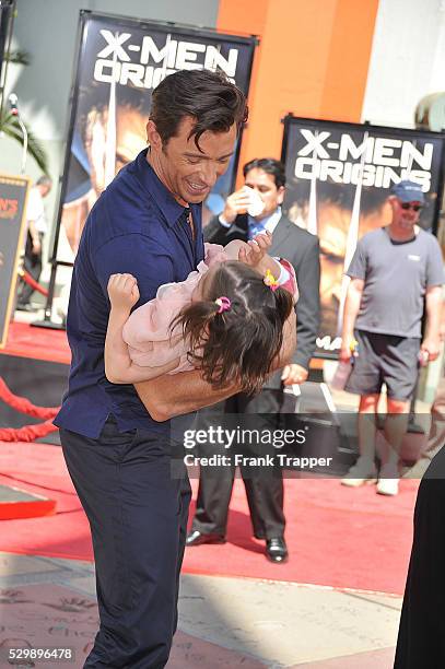 Actor Hugh Jackman and his daughter Ava attend Jackman's hand and footprints ceremony at Grauman's Chinese Theater.