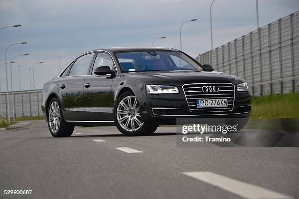 luxury limousine on the street - audi a8 stock pictures, royalty-free photos & images