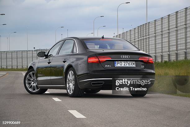 luxury limousine on the street - audi a8 stock pictures, royalty-free photos & images