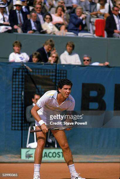 Andres Gomez of Ecuador waits for play during a match in the 1984 French Open at Roland Garros in Paris, France.