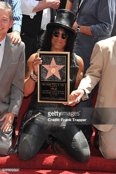 Musician Slash and guests attend the ceremony that honored him with a Star on the Hollywood Walk of Fame in front of the Hard Rock Cafe in Hollywood.