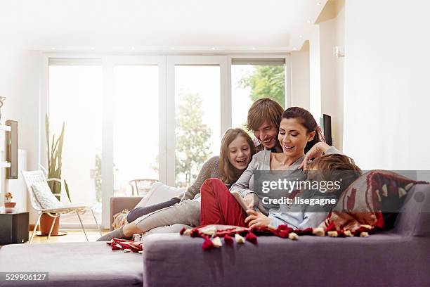 turkish family taking selfie - home comfort stockfoto's en -beelden