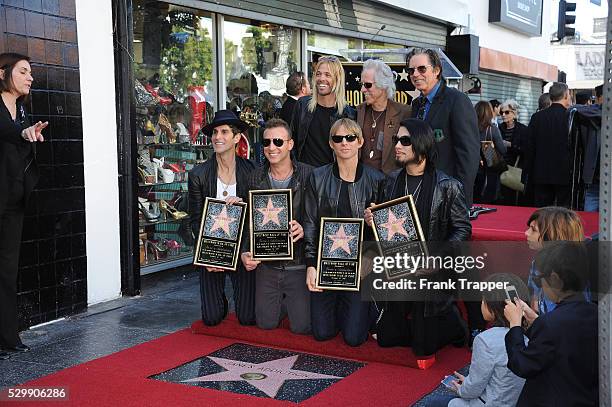 Musicians Taylor Hawkins , John Densmore and John Doe . Perry Farrell, Stephen Perkins, Chris Chaney and Dave Navarro from "Jane's Addiction" honored...