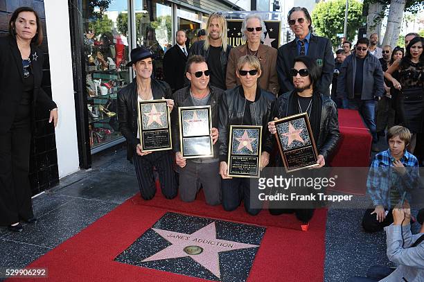 Musicians Taylor Hawkins , John Densmore and John Doe . Perry Farrell, Stephen Perkins, Chris Chaney and Dave Navarro from "Jane's Addiction" honored...