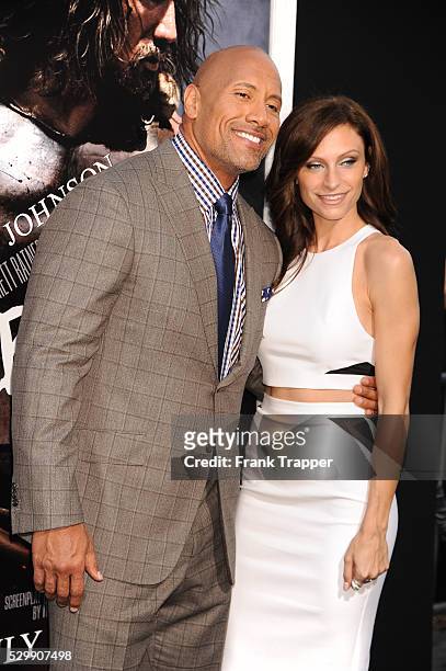 Actor Dwayne Johnson and guest arrive at the premiere of "Hercules" held at TCL Chinese Theater in Hollywood.