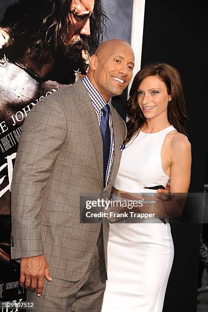 Actor Dwayne Johnson and guest arrive at the premiere of "Hercules" held at TCL Chinese Theater in Hollywood.