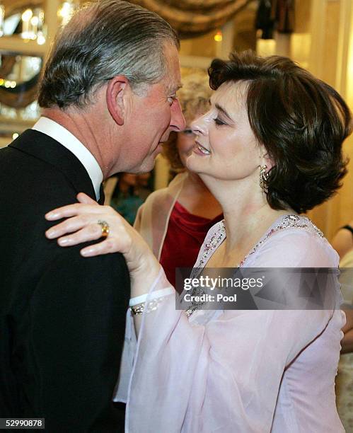 The Prince of Wales and Cherie Blair greet each other with a kiss at the Asian Women Of Achievement Awards at the London Hilton on May 26, 2005 in...