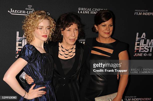 Actors Julia Garner, Lily Tomlin and Marcia Gay Harden arrive at the Los Angeles Film Festival opening night premiere of "Grandma" held at Regal...
