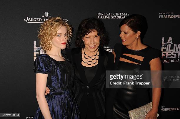 Actors Julia Garner, Lily Tomlin and Marcia Gay Harden arrive at the Los Angeles Film Festival opening night premiere of "Grandma" held at Regal...