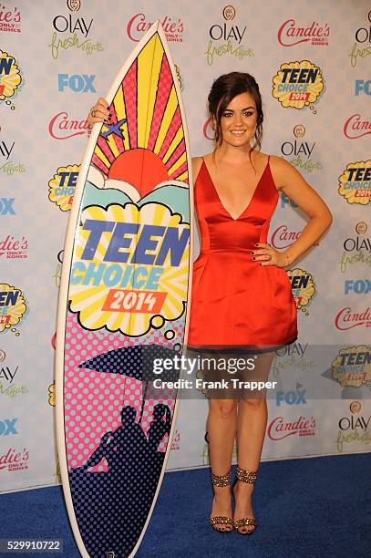 Actress Lucy Hale posing in the press room at the 2014 Teen Choice Awards held at the Shrine Auditorium.