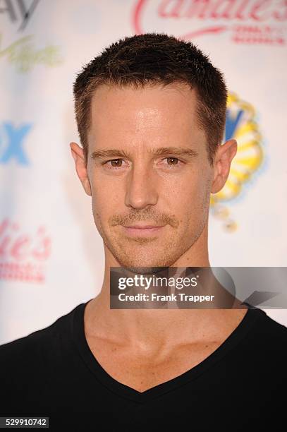 Actor Jason Dohring arrives at the 2014 Teen Choice Awards held at the Shrine Auditorium.