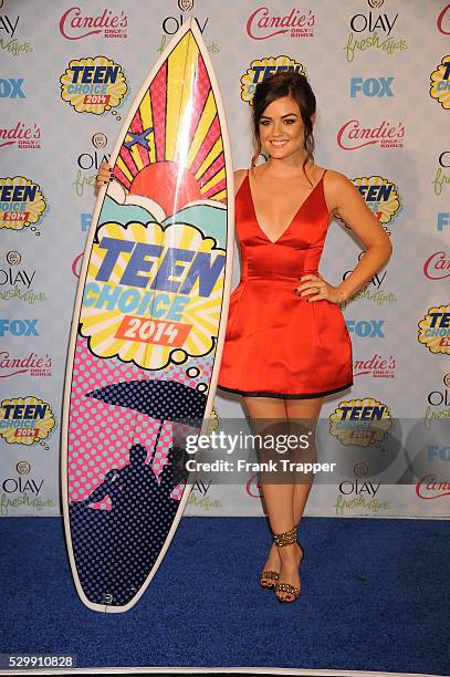 Actress Lucy Hale posing in the press room at the 2014 Teen Choice Awards held at the Shrine Auditorium.