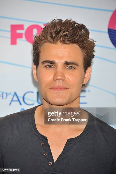 Actor Paul Wesley, winner of Choice Fantasy/Sci-Fi Show award, pose in the press room at the 2012 Teen Choice Awards held at the Gibson Amphitheatre...