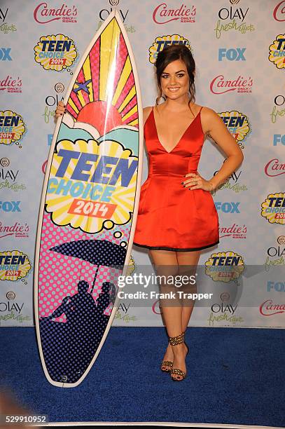 Actress Lucy Hale posing in the press room at the 2014 Teen Choice Awards held at the Shrine Auditorium.
