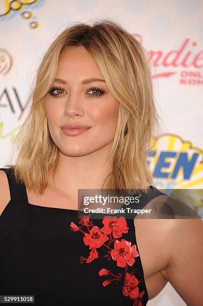 Actress Hilary Duff arrives at the 2014 Teen Choice Awards held at the Shrine Auditorium.