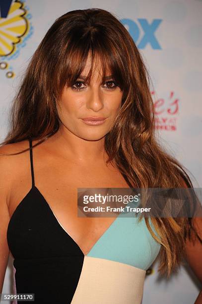 Actress Lea Michele posing in the press room at the 2014 Teen Choice Awards held at the Shrine Auditorium.