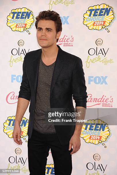 Actor Paul Wesley arrives at the 2014 Teen Choice Awards held at the Shrine Auditorium.