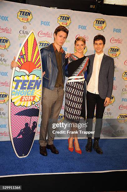 Actors Ansel Elgort, Shailene Woodley and Nat Wolff pose in the press room at the 2014 Teen Choice Awards held at the Shrine Auditorium.