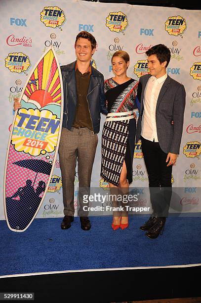 Actors Ansel Elgort, Shailene Woodley and Nat Wolff pose in the press room at the 2014 Teen Choice Awards held at the Shrine Auditorium.