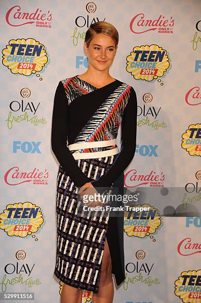 Actress Shailene Woodley posing in the press room at the 2014 Teen Choice Awards held at the Shrine Auditorium.