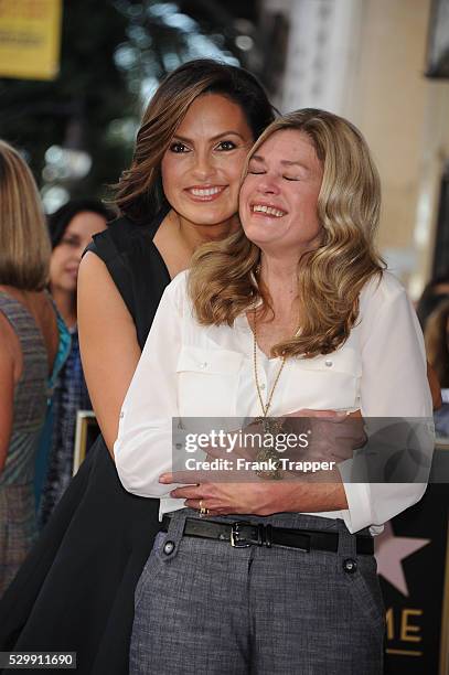 Actress Mariska Hargitay and sister Tina pose at the ceremony that honored with a Star on the Hollywood Walk of Fame.