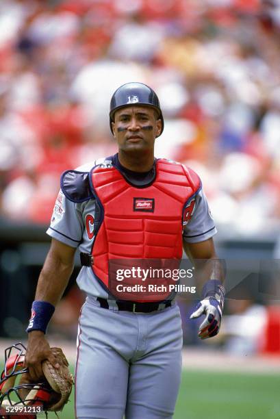 Sandy Alomar Jr. Of the Cleveland Indians wears catcher's gear and carries his mask during an MLB game on June 15, 1997 at Busch Stadium in St....