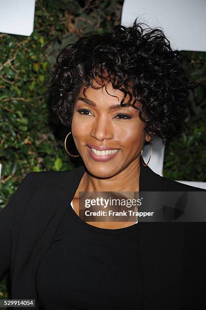 Actress Angela Bassett arrives at the premiere of "Mandela: Long Walk To Freedom" held at the ArcLight Hollywood Cinerama Dome.