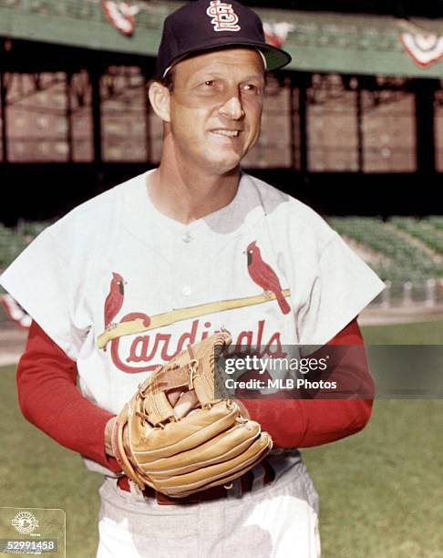 Stan Musial of the St. Louis Cardinals poses for a portrait in midswing. Stan Musial played for the St. Louis Cardinals from 1941-1963.