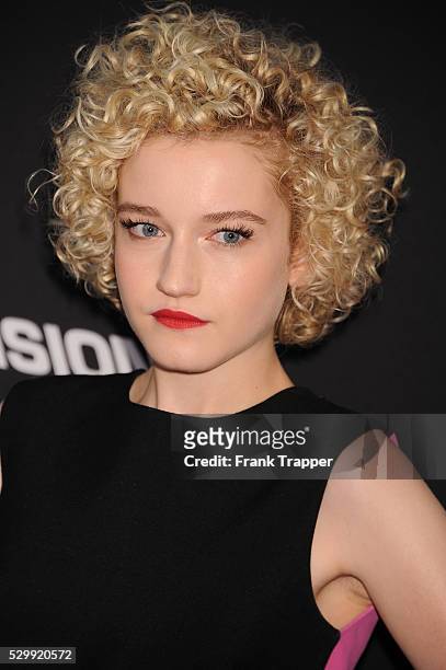 Actress Julia Garner arrives at the premiere of "Sin City: A Dame To Kill For" held at TCL Chinese Theater in Hollywood.