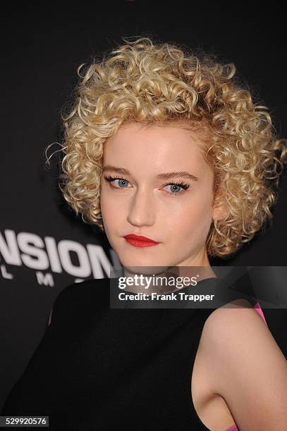 Actress Julia Garner arrives at the premiere of "Sin City: A Dame To Kill For" held at TCL Chinese Theater in Hollywood.