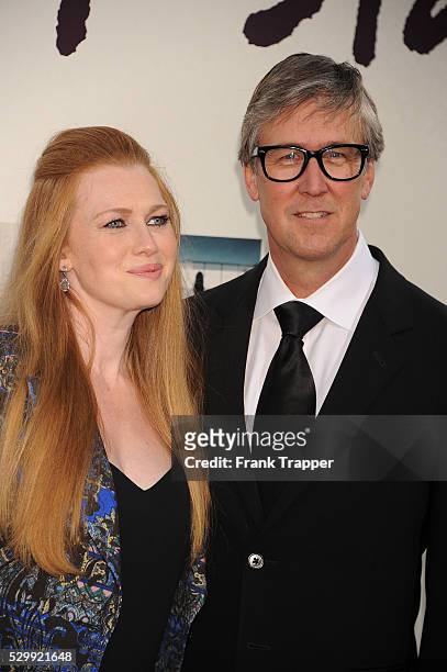Actors Alan Ruck and Mireille Enos arrive at the premiere of "If I Stay" held at TCL Chinese Theater in Hollywood.