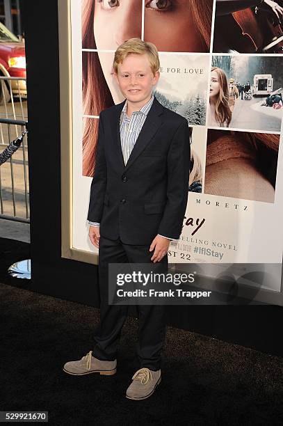 Actor Jakob Davies arrives at the premiere of "If I Stay" held at TCL Chinese Theater in Hollywood.