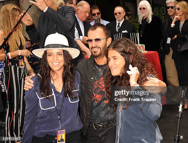 Director Francesca Gregorini, recording artist Ringo Starr and actress Olga Segura arrive at the Ringo Starr 75th Birthday fan gathering held at...