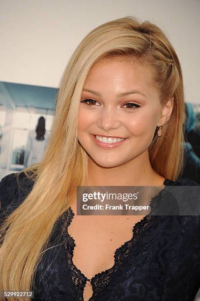 Actress Olivia Holt arrives at the premiere of "If I Stay" held at TCL Chinese Theater in Hollywood.