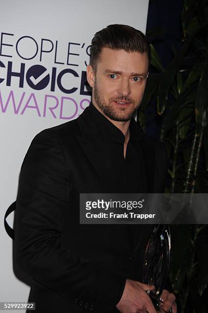 Singer-actor Justin Timberlake, winner of the Favorite Album, Favorite Male Artist and Favorite Pop Artist awards, posing in the press room at The...