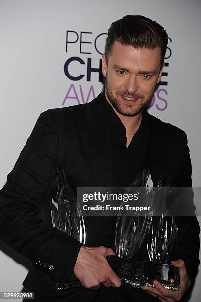 Singer-actor Justin Timberlake, winner of the Favorite Album, Favorite Male Artist and Favorite Pop Artist awards, posing in the press room at The...