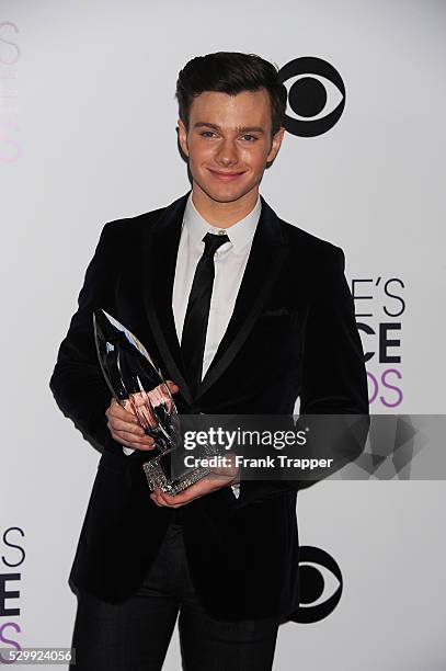 Actor Chris Colfer, winner of the Favorite Comedic TV Actor award for "Glee", posing in the press room at The 40th Annual People's Choice Awards at...