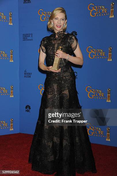 Actress Cate Blanchett, winner of Best Actress in a Motion Picture - Drama for 'Blue Jasmine", posing at the 71st Annual Golden Globe Awards held at...