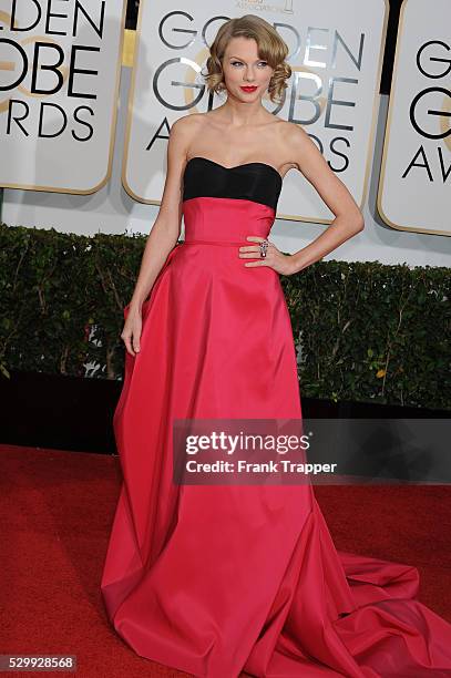 Singer Taylor Swift arrives at the 71st Annual Golden Globe Awards held at The Beverly Hilton Hotel.