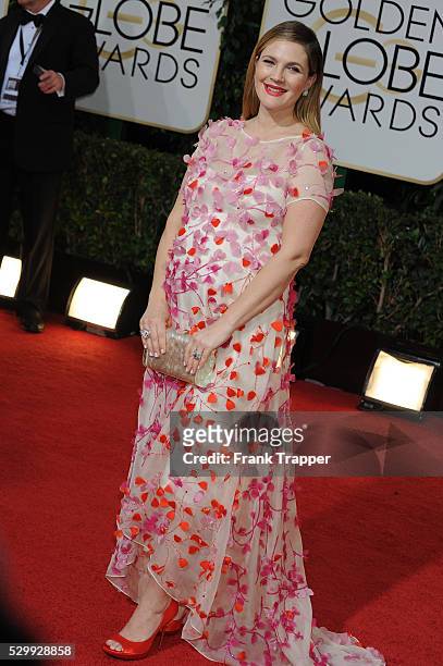 Actress Drew Barrymore arrives at the 71st Annual Golden Globe Awards held at The Beverly Hilton Hotel.