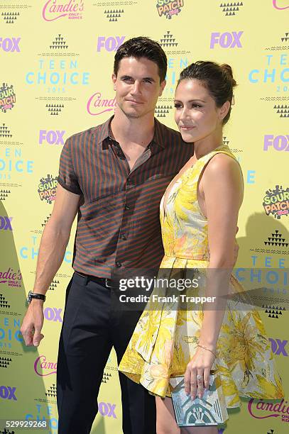 Actors Robbie Amell and Italia Ricci arrive at the Teen Choice Awards 2015 held at the USC Galen Center.