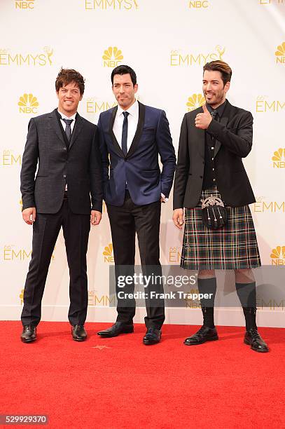 Personalities J. D. Scott, Drew Scott and Jonathan Silver Scott arrive at the 66th Annual Primetime Emmy Awards held at the Nokia Theater L.A. Live.