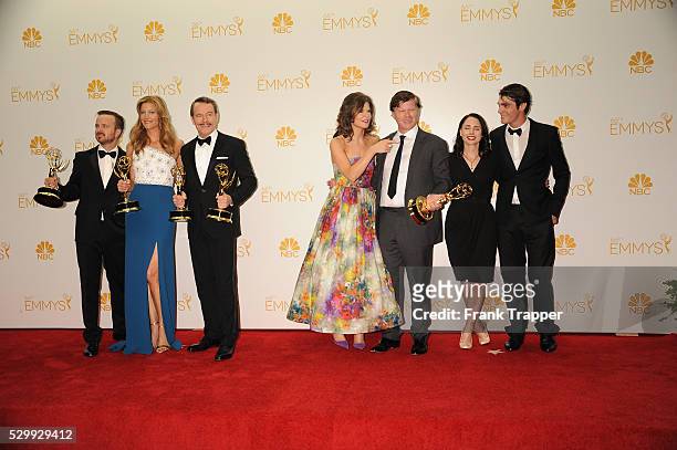 Actors Aaron Paul, Anna Gunn, Bryan Cranston, Betsy Brandt, Jesse Plemons, Laura Fraser, and RJ Mitte, winners of Outstanding Drama Series for...