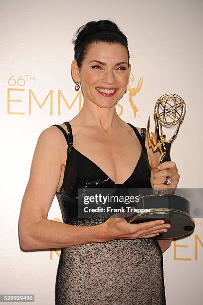 Actress Julianna Margulies, winner of Outstanding Lead Actress In A Drama Series for "The Good Wife" posing at the 66th Annual Primetime Emmy Awards...