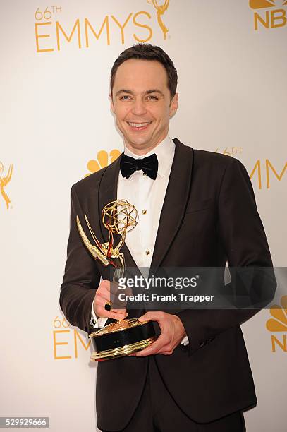 Actor Jim Parsons, winner of Outstanding Lead Actor In A Comedy Series for "The Big Bang Theory" posing at the 66th Annual Primetime Emmy Awards held...