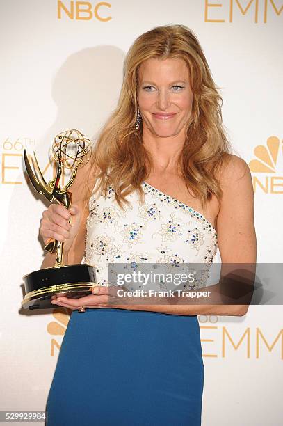 Actress Anna Gunn, winner of Outstanding Supporting Actress In A Drama Series and Outstanding Series for "Breaking Bad" posing at the 66th Annual...